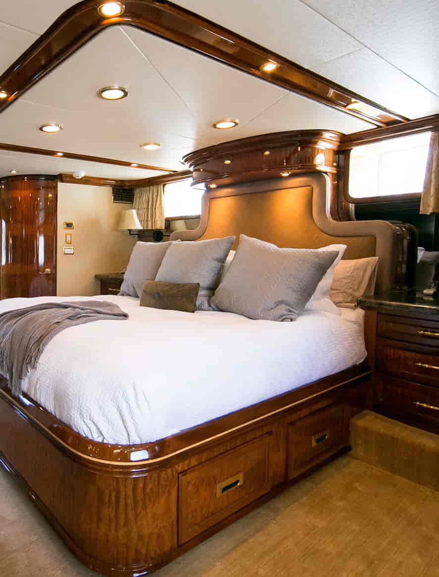 Aurora's guest staterooms with warm wood and luxe finishes
